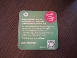 Bierdeckel mit Gruenen Wahlkampfaufruf